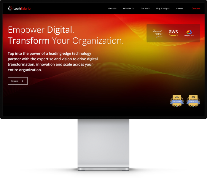 Large desktop screen showing TechFabric's website.